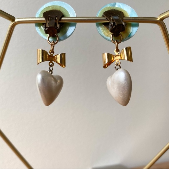 Redesigned blue opalescent clip on earrings with bow and faux pearl heart dangle - Picture 7 of 13